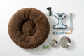 New Puppy Essentials Bundle – premium puppy products flat lay including chocolate calming bed, Cocopup London harness, collar, lead, bowls and more
